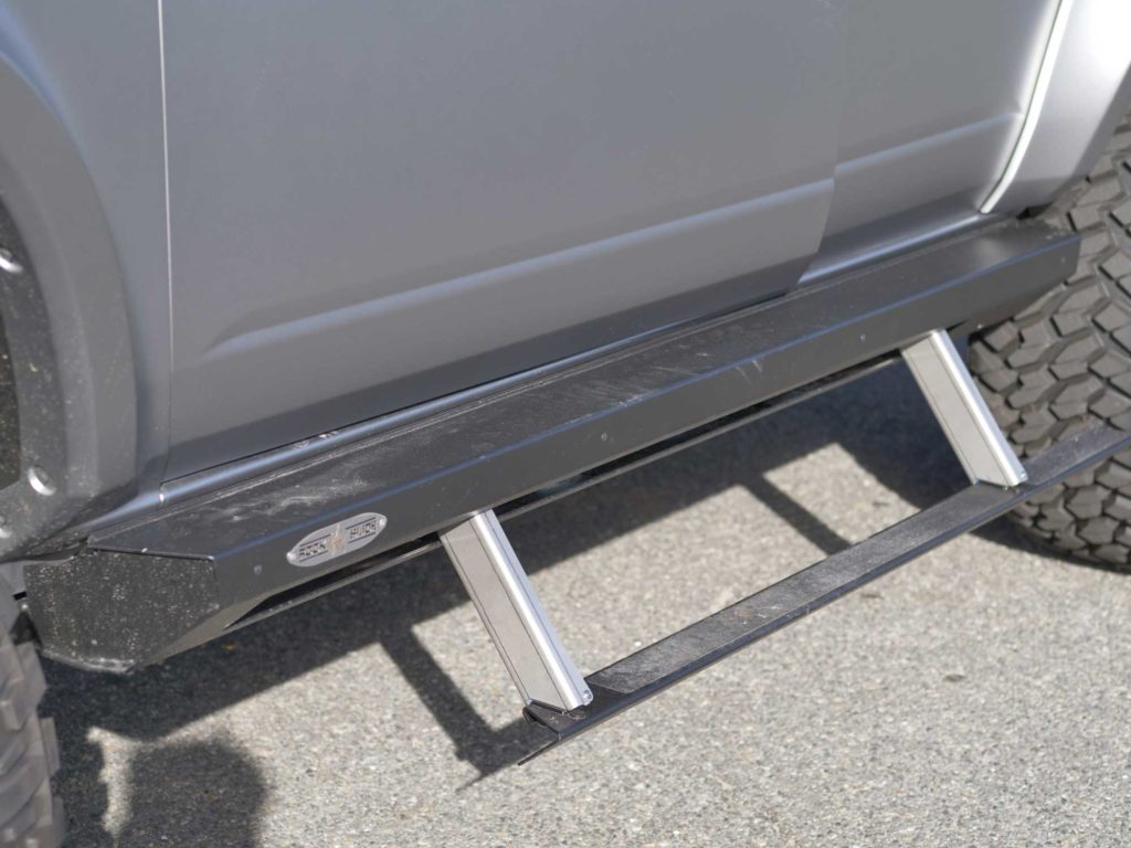 Silver Ford Bronco Rock Slide Engineering Retractable Steps